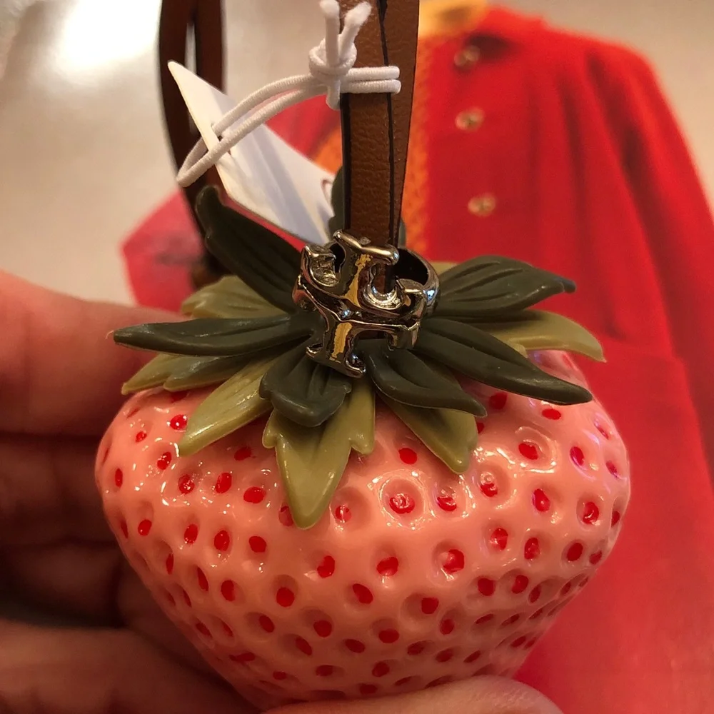 Authentic New with tag. Tory Burch Pink Strawberry bag charm.